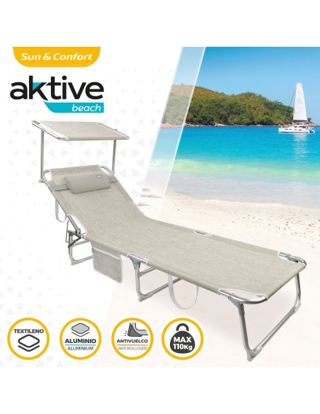 Chaise longue pliante beige avec parasol et coussin